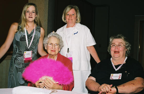 Four Phi Mus With Pink Fan at Convention Photograph, July 4-8, 2002 (image)