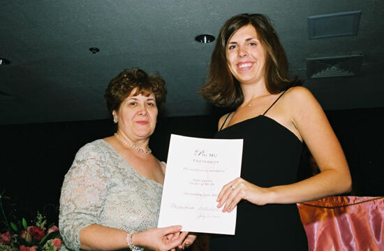 Mary Jane Johnson and Alpha Upsilon Chapter Member With Certificate at Convention Photograph, July 4-8, 2002 (image)