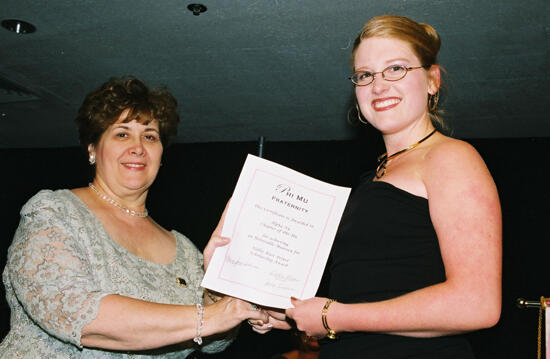 Mary Jane Johnson and Alpha Nu Chapter Member With Certificate at Convention Photograph 2, July 4-8, 2002 (image)