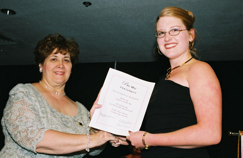 Mary Jane Johnson and Alpha Nu Chapter Member With Certificate at Convention Photograph 2, July 4-8, 2002 (Image)