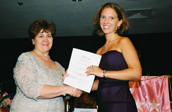 Mary Jane Johnson and Delta Omega Chapter Member With Certificate at Convention Photograph, July 4-8, 2002 (image)