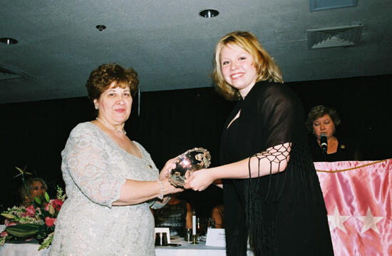 Mary Jane Johnson and Unidentified With Award at Convention Photograph 14, July 4-8, 2002 (image)