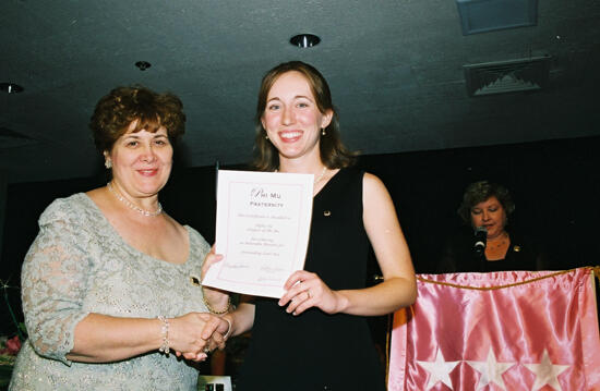 Mary Jane Johnson and Alpha Nu Chapter Member With Certificate at Convention Photograph 3, July 4-8, 2002 (image)