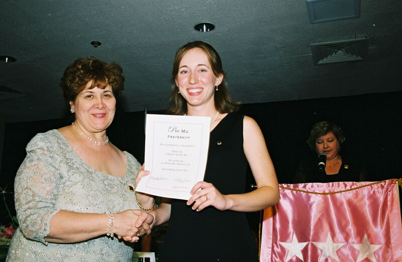 Mary Jane Johnson and Alpha Nu Chapter Member With Certificate at Convention Photograph 3, July 4-8, 2002 (Image)