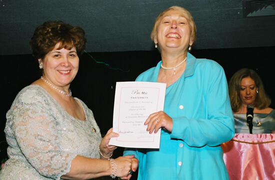 Mary Jane Johnson and Cleveland Alumnae Chapter Member With Certificate at Convention Photograph, July 4-8, 2002 (image)