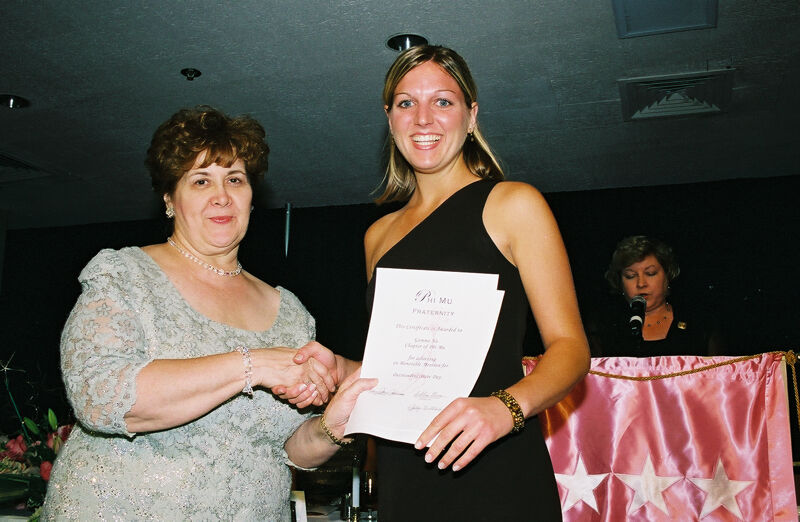 Mary Jane Johnson and Gamma Nu Chapter Member With Certificate at Convention Photograph, July 4-8, 2002 (Image)