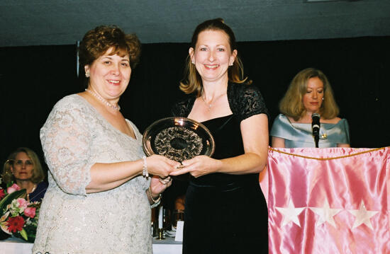 Mary Jane Johnson and Unidentified With Award at Convention Photograph 6, July 4-8, 2002 (image)