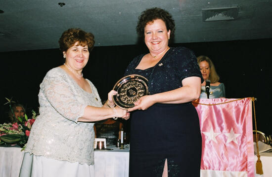 Mary Jane Johnson and Unidentified With Award at Convention Photograph 5, July 4-8, 2002 (image)