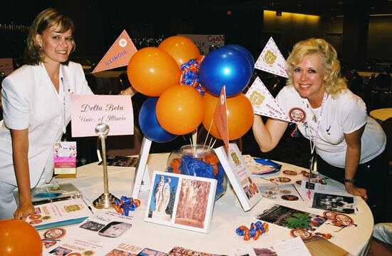 Two Phi Mus by Delta Beta Chapter Reunion Table at Convention Photograph 2, July 4-8, 2002 (image)