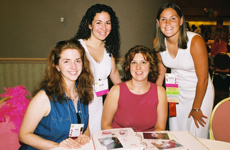 Kornstein, Bailey, Unidentified, and Page at Convention Photograph, July 4-8, 2002 (Image)