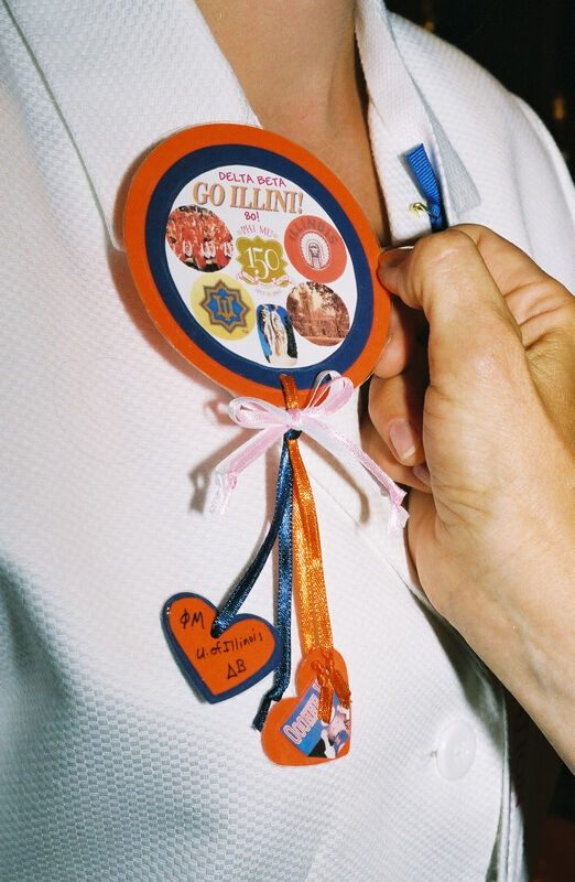 Unidentified Phi Mu Wearing Delta Beta Chapter Button at Convention Photograph 2, July 4-8, 2002 (Image)