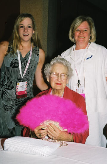 Three Phi Mus With Pink Fan at Convention Photograph, July 4-8, 2002 (image)