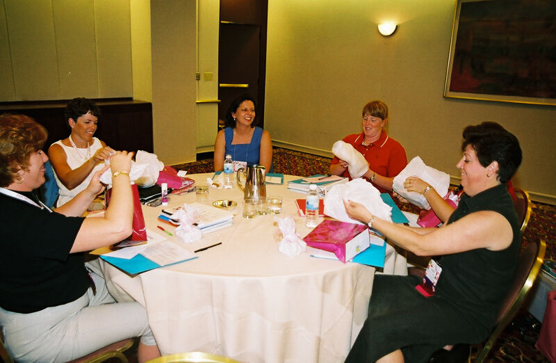 Table of Phi Mus Opening Gifts at Convention Photograph, July 4-8, 2002 (Image)
