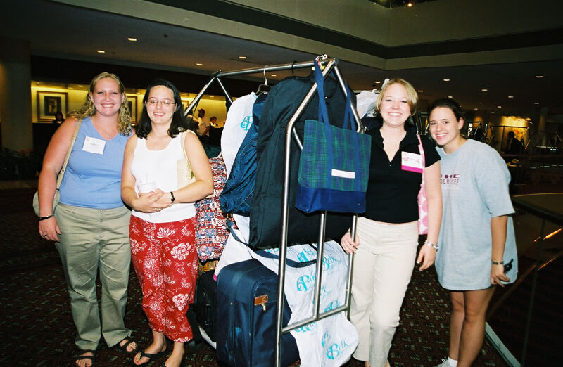 Four Phi Mus With Luggage Cart at Convention Photograph 1, July 4-8, 2002 (Image)