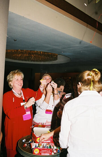 Lana Lewis and Others Set Off Poppers at Convention Photograph 6, July 4, 2002 (image)