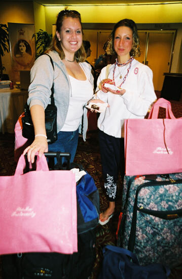 Two Phi Mus With Luggage at Convention Photograph, July 4-8, 2002 (image)