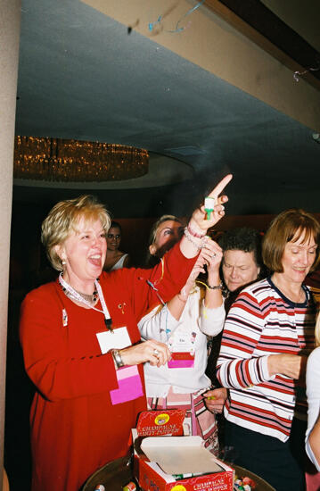 Lana Lewis and Others Set Off Poppers at Convention Photograph 2, July 4, 2002 (image)