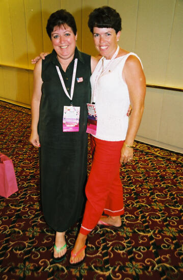 Susie McNamara and Mary Beth Straguzzi Modeling Sandals at Convention Photograph, July 4-8, 2002 (image)