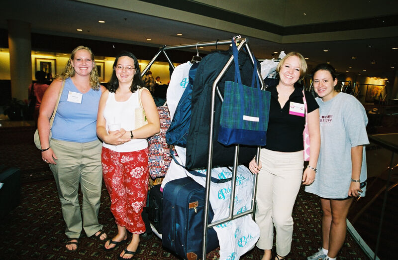 Four Phi Mus With Luggage Cart at Convention Photograph 2, July 4-8, 2002 (Image)