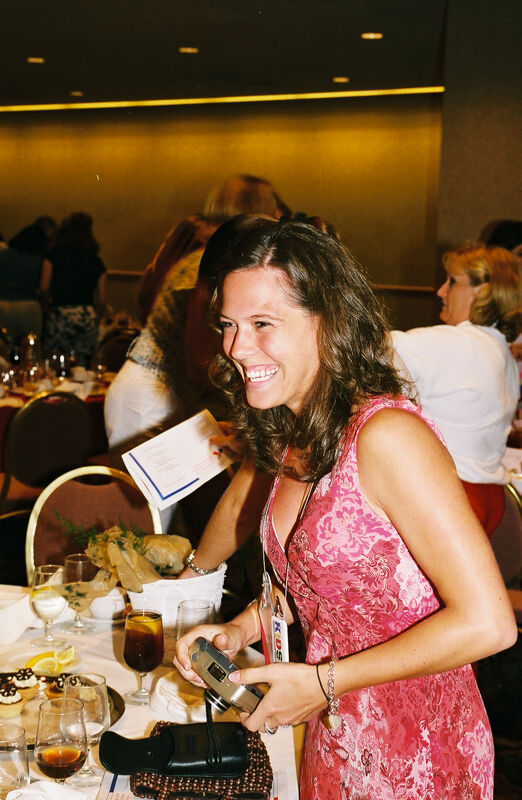 Unidentified Phi Mu in Pink Dress at Convention Dinner Photograph, July 4-8, 2002 (Image)