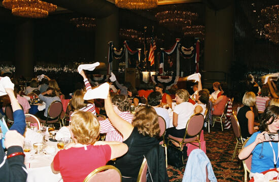 Phi Mus Waving White Handkerchiefs at Convention Dinner Photograph, July 4-8, 2002 (image)