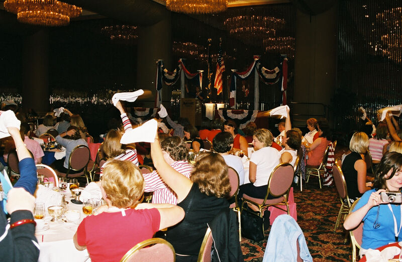 Phi Mus Waving White Handkerchiefs at Convention Dinner Photograph, July 4-8, 2002 (Image)