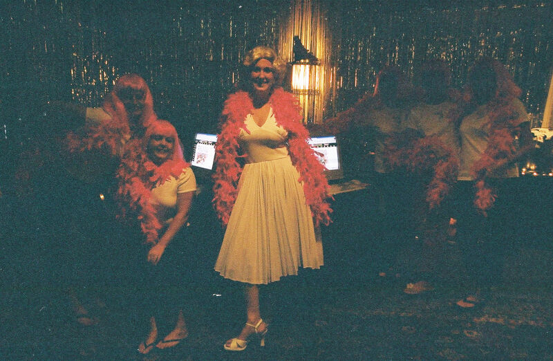 Phi Mus in Pink Wigs and Boas at Convention Photograph 4, July 4-8, 2002 (Image)