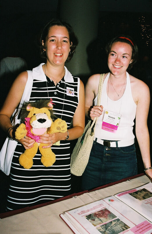 July 4-8 Unidentified and Michele With Stuffed Lion at Convention Photograph 2 Image