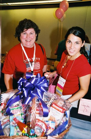 Unidentified and Michelle With Basket at Convention Photograph 2, July 4-8, 2002 (image)