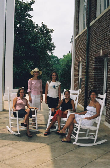 Group of Five in Rocking Chairs at Wesleyan College During Convention Photograph 5, July 4-8, 2002 (image)