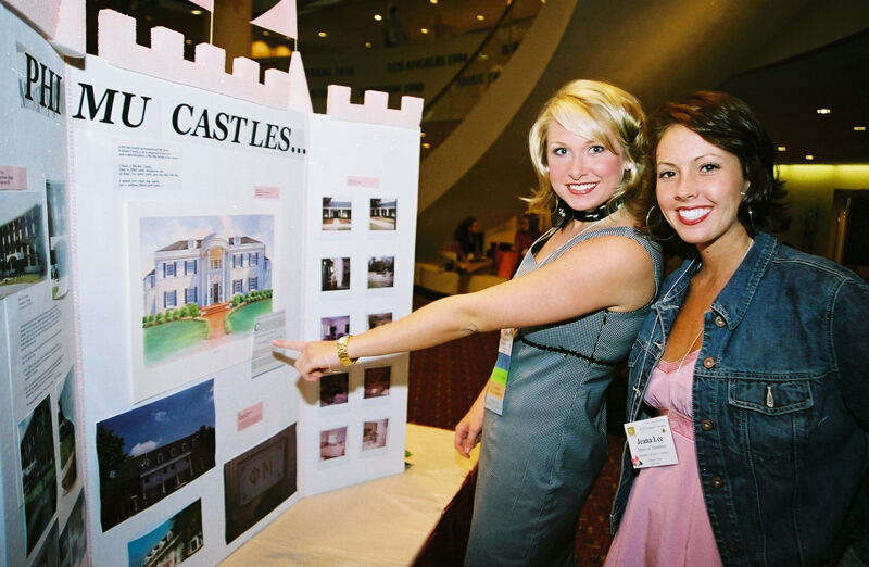 Two Phi Mus by Housing Display at Convention Photograph 3, July 4-8, 2002 (Image)