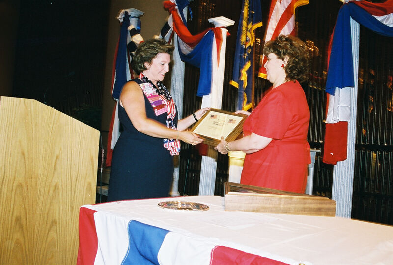 Frances Mitchelson and Mary Jane Johnson With Plaque at Convention Welcome Dinner Photograph, July 4, 2002 (Image)