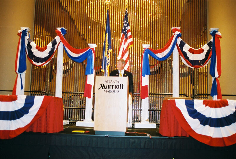 Johnny Isakson Speaking at Convention Welcome Dinner Photograph 12, July 4, 2002 (Image)