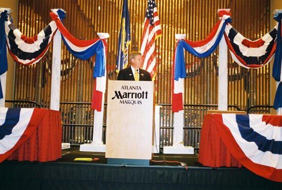 Johnny Isakson Speaking at Convention Welcome Dinner Photograph 9, July 4, 2002 (image)