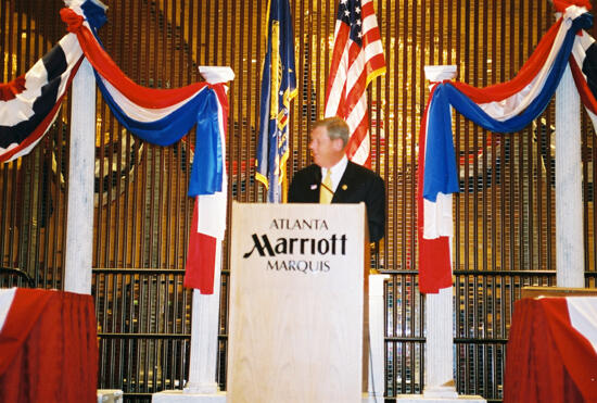 Johnny Isakson Speaking at Convention Welcome Dinner Photograph 11, July 4, 2002 (image)