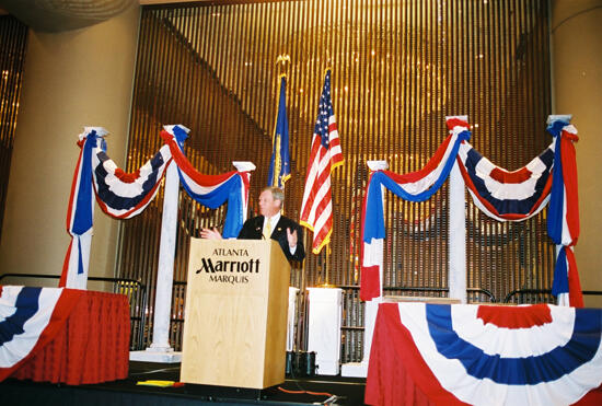 Johnny Isakson Speaking at Convention Welcome Dinner Photograph 2, July 4, 2002 (image)