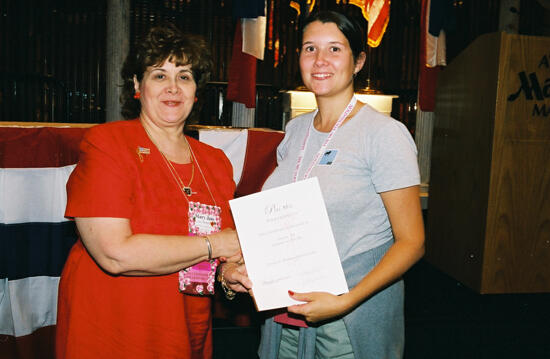 Mary Jane Johnson and Austin Alumnae Chapter Member With Certificate at Convention Photograph 2, July 4-8, 2002 (image)