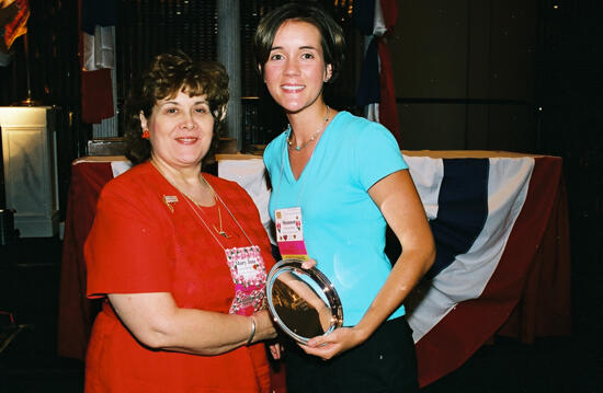 Mary Jane Johnson and Shannon With Award at Convention Photograph, July 4-8, 2002 (image)