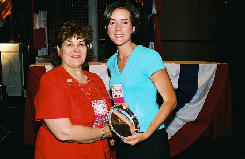 Mary Jane Johnson and Shannon With Award at Convention Photograph, July 4-8, 2002 (Image)