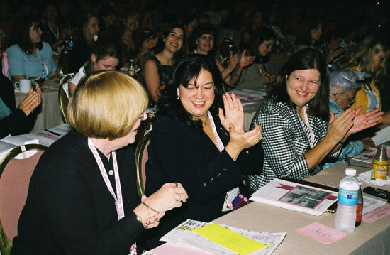 Dusty Manson and Monica Amor Applauding at Convention Photograph 2, July 4-8, 2002 (image)