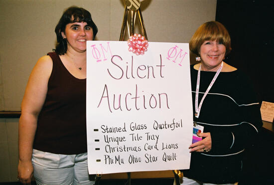 Dusty Manson and Unidentified by Silent Auction Sign at Convention Photograph 2, July 4-8, 2002 (image)