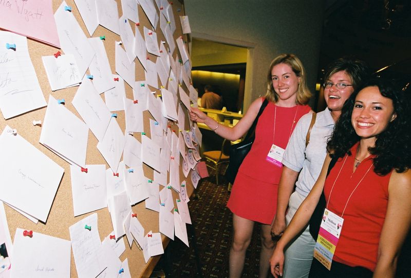 July 4-8 Three Phi Mus by Bulletin Board at Convention Photograph 1 Image