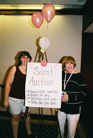 Dusty Manson and Unidentified by Silent Auction Sign at Convention Photograph 1, July 4-8, 2002 (image)