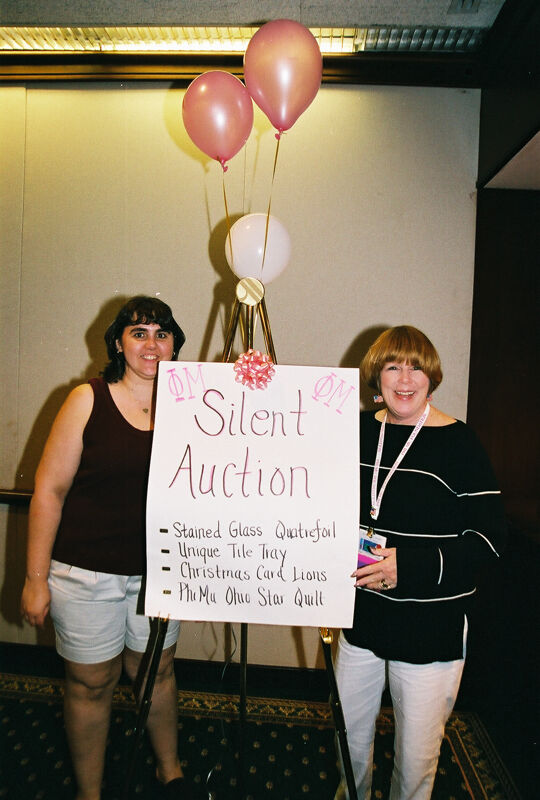 Dusty Manson and Unidentified by Silent Auction Sign at Convention Photograph 1, July 4-8, 2002 (Image)
