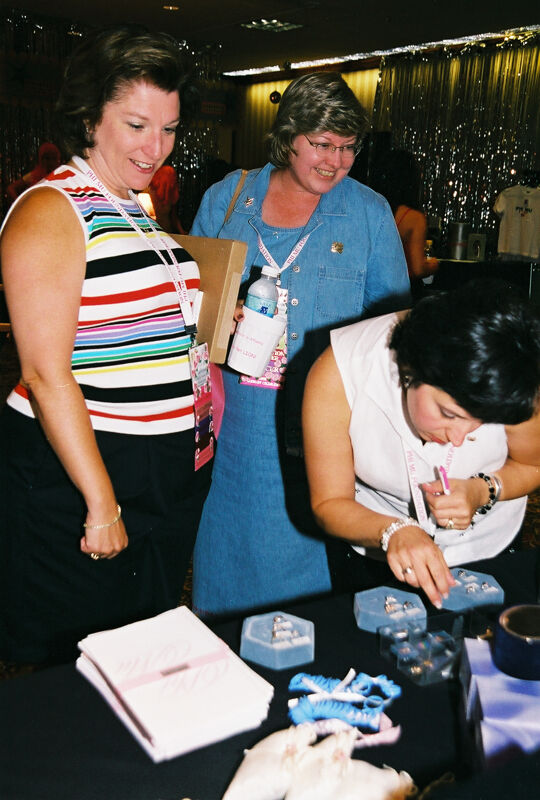 Frances Mitchelson and Two Phi Mus in Convention Carnation Shop Photograph, July 4-8, 2002 (Image)