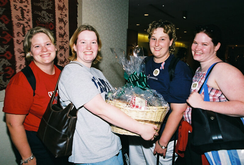 Four Phi Mus With Gift Basket at Convention Photograph, July 4-8, 2002 (Image)