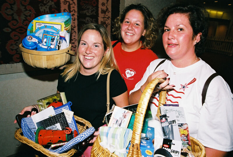 Three Phi Mus With Gift Baskets at Convention Photograph 2, July 4-8, 2002 (Image)