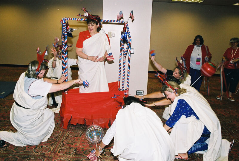 National Council Members Bowing to Mary Jane Johnson at Convention Parade Photograph 1, July 4, 2002 (Image)