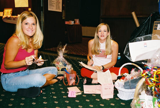 Two Phi Mus With Baskets at Convention Photograph 2, July 4-8, 2002 (image)