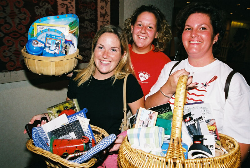 Three Phi Mus With Gift Baskets at Convention Photograph 1, July 4-8, 2002 (Image)